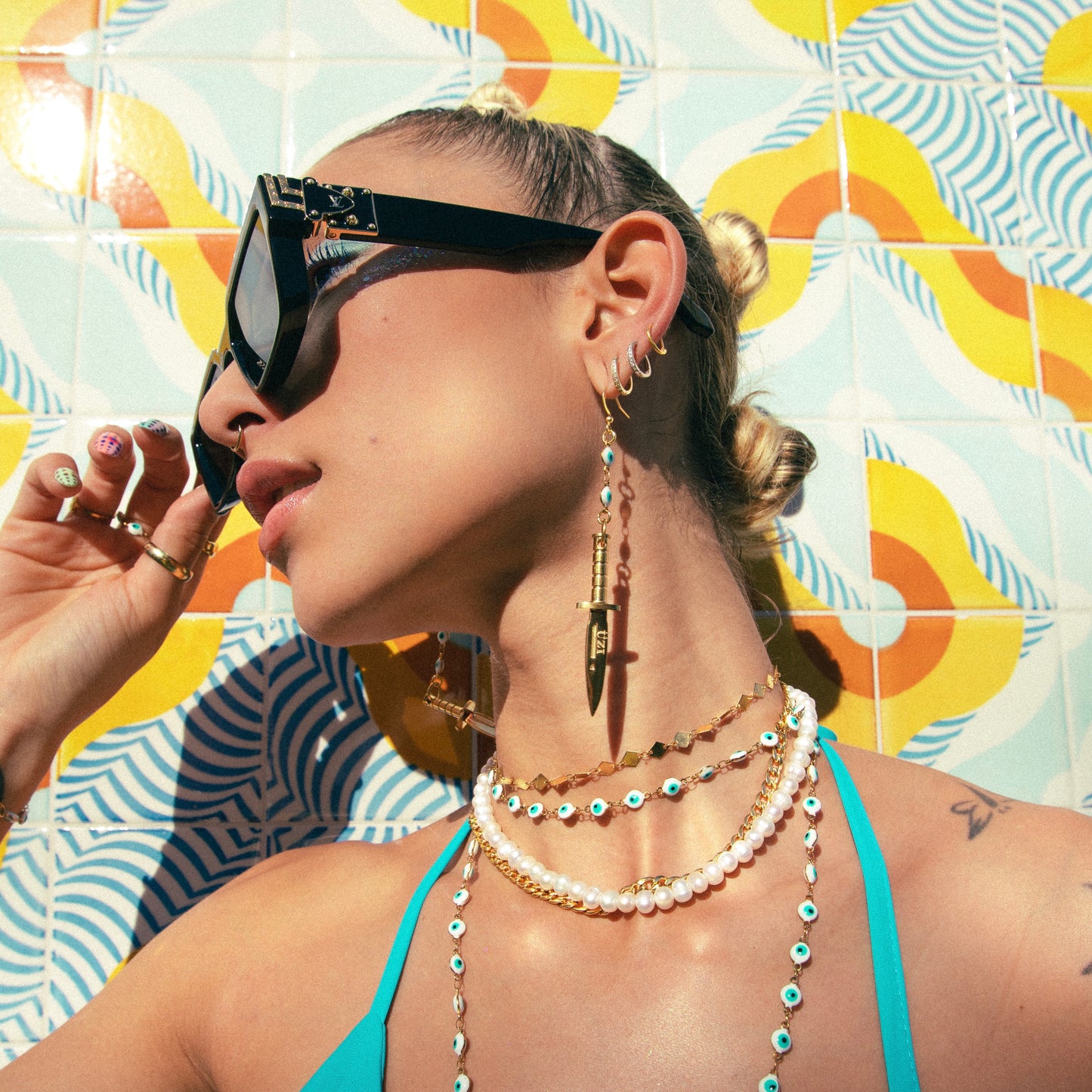 EVIL EYE DAGGER EARRINGZ